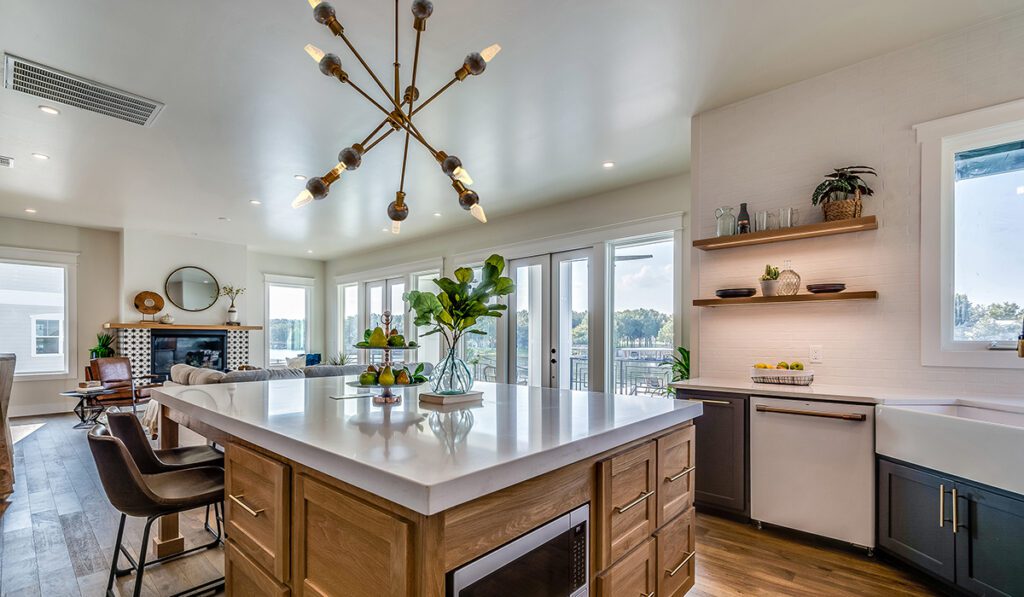 Kitchen with dark blues and natural wood  throughout